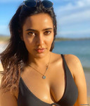 Neha Sharma Black Bikini cleavage