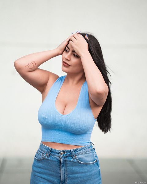 Mayla Muse on deep cut tank top shoot by Julian Schuster